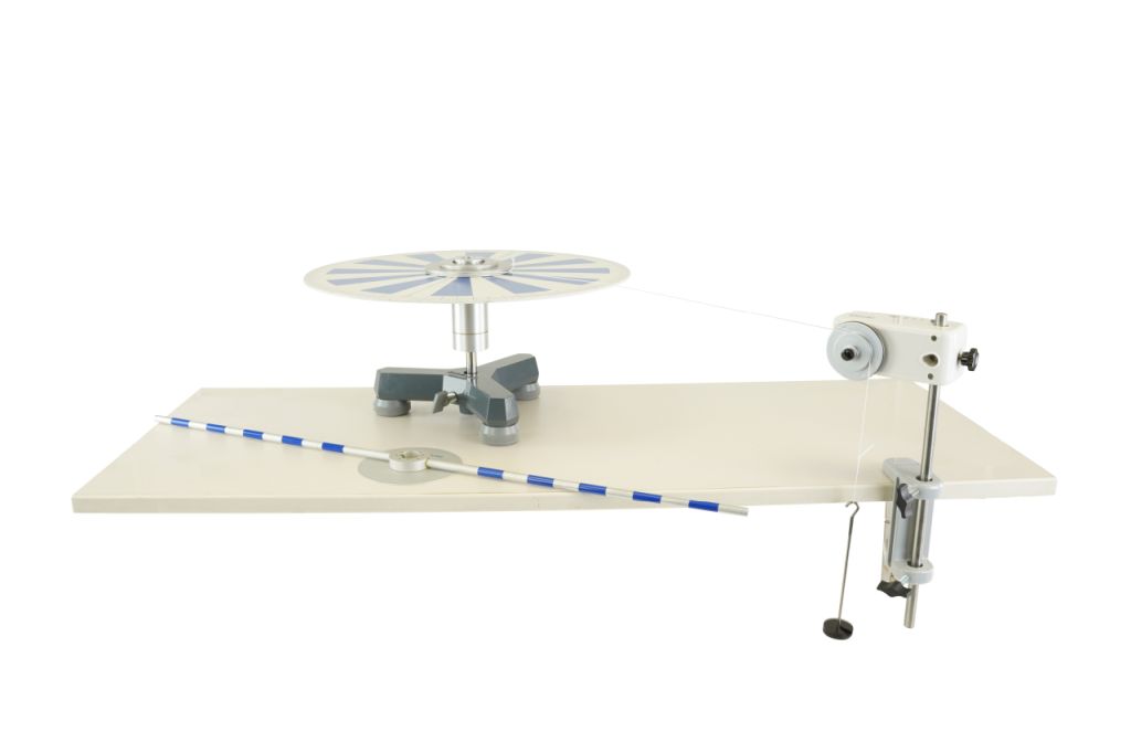 Moment of inertia and angular acceleration with Cobra SMARTsense and a precision pivot bearing
